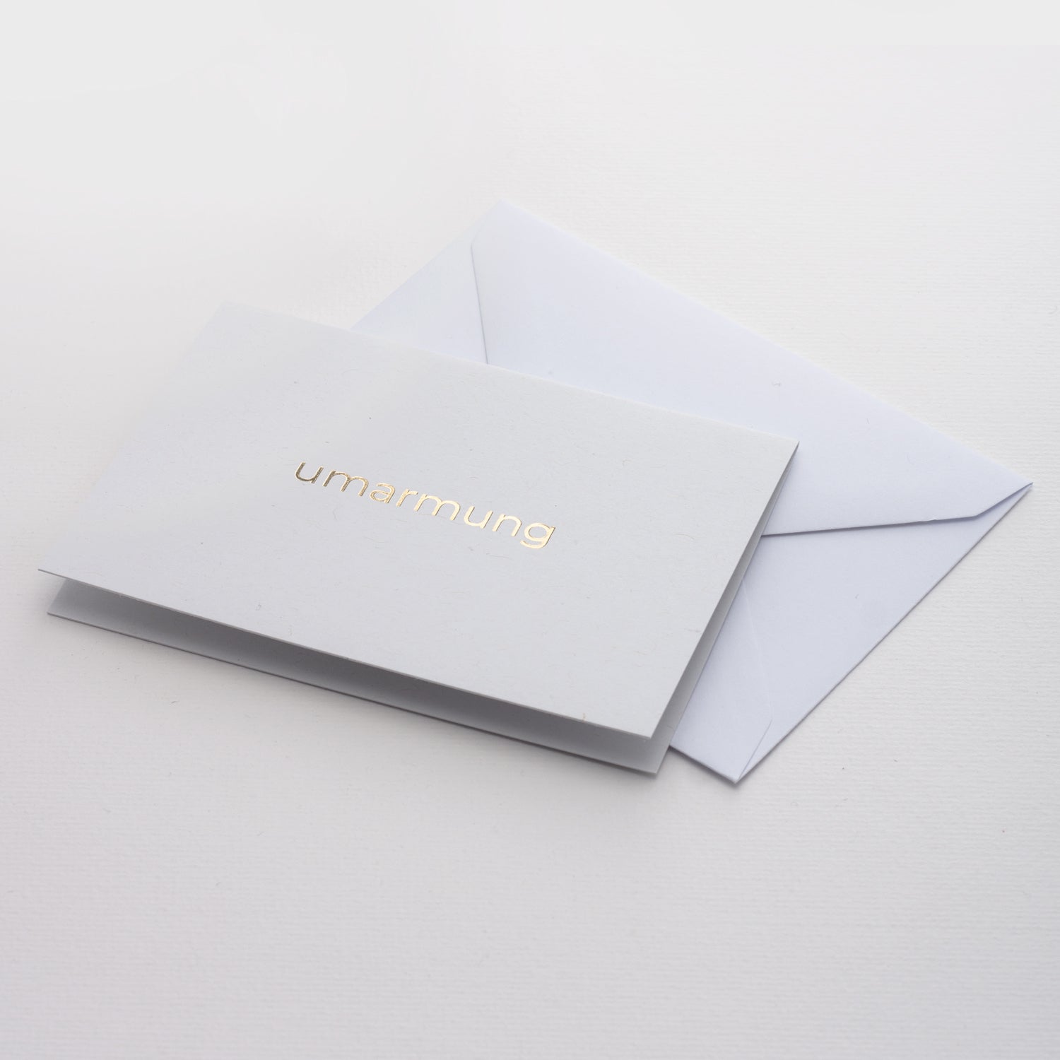 Grußkarte Umarmung - weiß